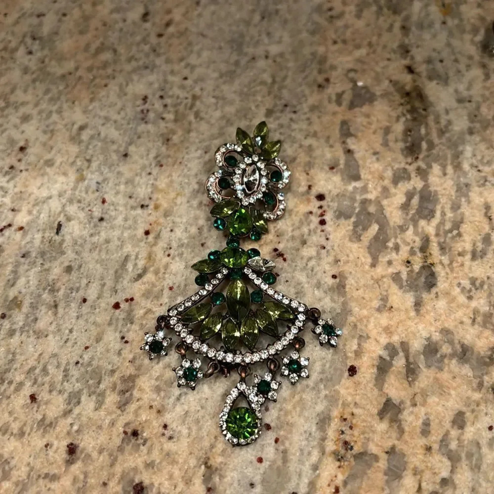 Woman's gorgeous sparkly crystal earring. It's only women earring. Faux crystals